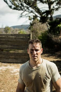 Portrait of soldier standing in boot camp