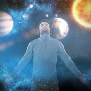 Man with arms outstretched while listening music against graphic image of solar system 3d