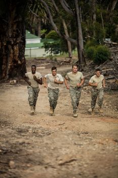 Soldiers running in boot camp