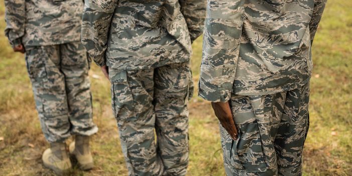 Group of military soldiers standing in line at boot camp