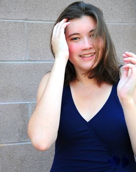 Female beauty expressions wearing a swimsuit outside.