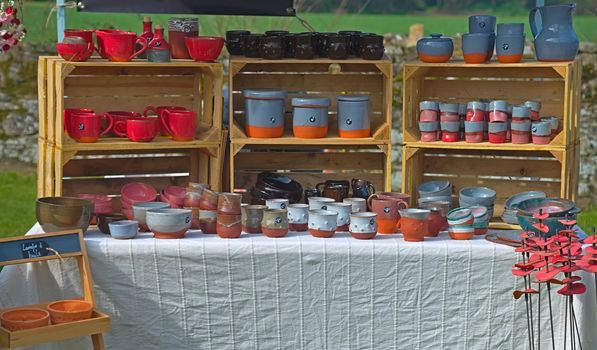 Market stall with various ceramic tea cups