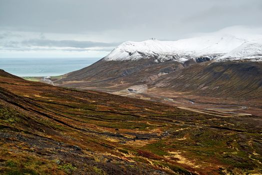 Mountains and ocean view in Borgarfjordur Eystri in east Iceland in a cloudy day