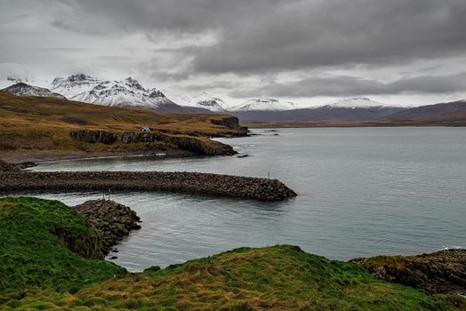 Little harbour in Borgarfjordur Eystri in east Iceland in a cloudy day