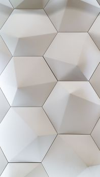 3D decorative wall for the interior of an unusual hexagonal geometric shape similar to honeycombs. White light background with a pattern imitating a tree. Abstract texture
