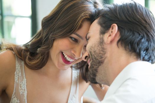 Close-up of romantic young couple spending leisure time in restaurant