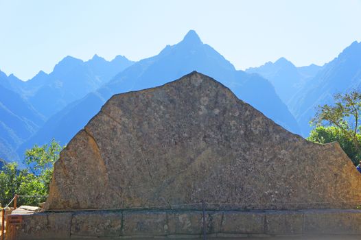 The sacred rock ("roca sagrada") was formed to resemble the Andes mountain peaks in the background.