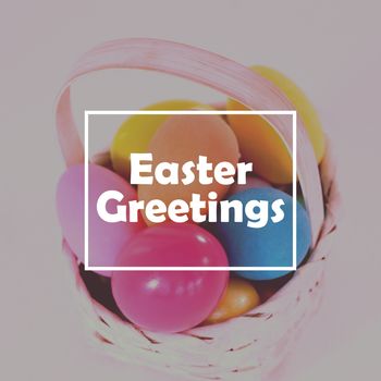 Easter greeting against various easter eggs in wicker basket