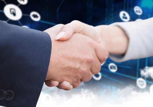 Composite image of business people doing handshake