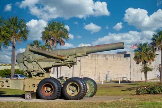 An old howitzer cannon outside a coatal fort