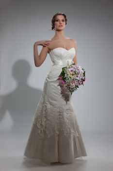 Young beautiful woman in a wedding dress