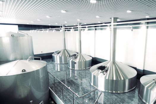 Small brewery. Equipment for brewing beer. Stainless steel on brewing equipment.