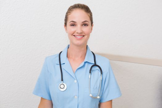 Dental assistant smiling at camera at the dental clinic