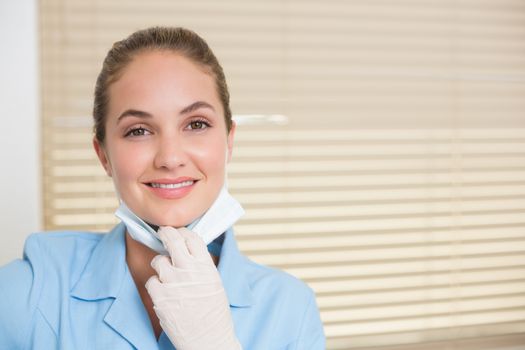 Dental assistant smiling at camera at the dental clinic