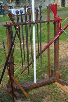 Wooden sack full of medieval weapons