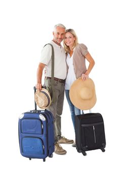 Happy couple ready to go on holiday on white background