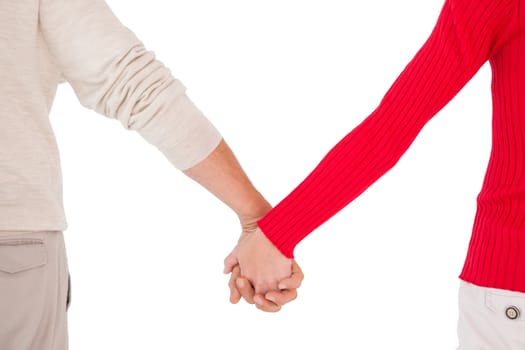 Couple holding hands rear view on white background