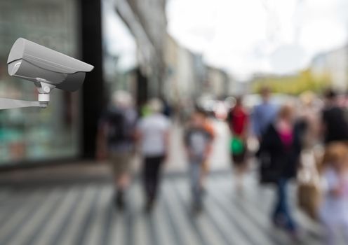 Digital composite of cctv. Blurred street with people