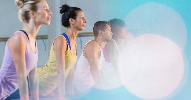 Digital composite of People performing yoga at gym