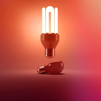 Digital image of illuminated energy efficient lightbulb over bulb on gray background