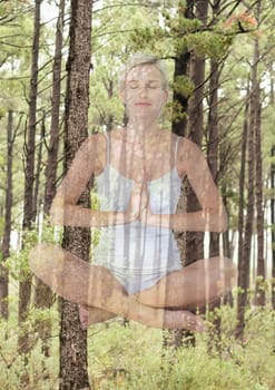 Digital composite of Woman doing yoga in front of wood