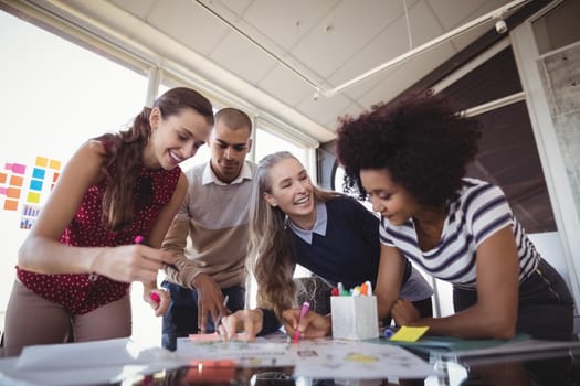 Low angle view of creative business people planning in office