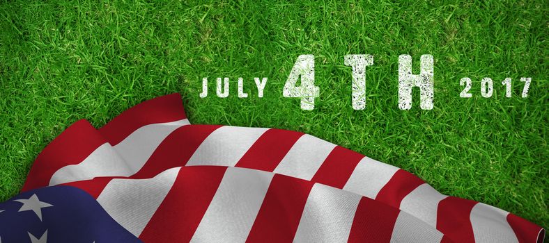 Multi colored happy 4th of july text against white background against closed up view of grass