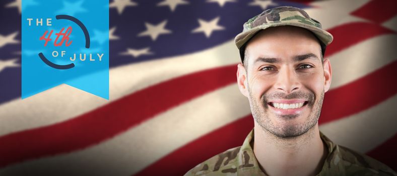 Close up of smiling soldier against colorful happy 4th of july text against white background