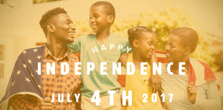 Computer graphic image of happy 4th of july text against happy family with american flag on sunny day