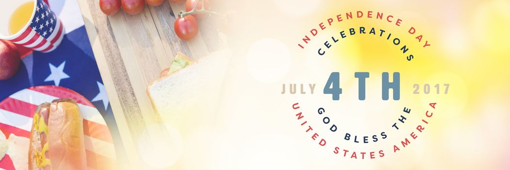 Multi colored happy 4th of july text against white background against american lunch with hot dog and soda