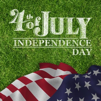 Independence day graphic against closed up view of grass