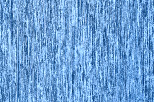 Abstract grungy decorative texture. Textured paper with copy space. Motley surface of blue paper, texture closeup.