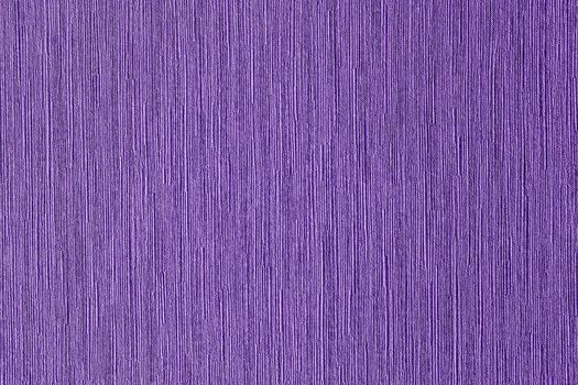 Abstract grungy decorative texture. Textured paper with copy space. The mottled surface of the paper is purple, texture closeup.