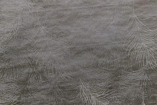 Taupe abstract grungy decorative texture. Textured paper with copy space. Motley gray paper surface, texture closeup.