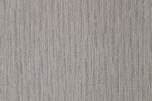 Taupe abstract grungy decorative texture. Textured paper with copy space. Motley gray paper surface, texture closeup.