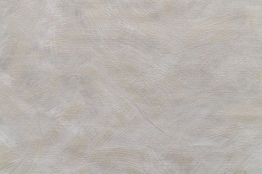 Taupe abstract grungy decorative texture. Textured paper with copy space. Motley gray-brown paper surface, texture closeup.