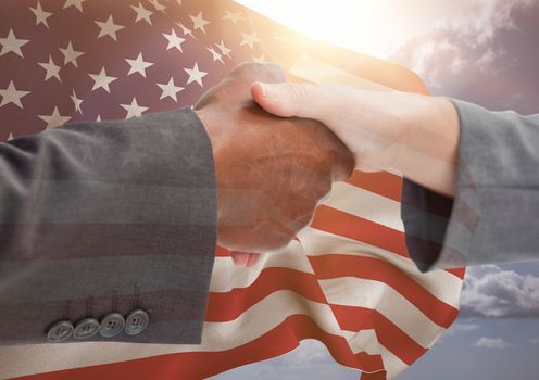 Digital composite of people shaking their hands against american flag