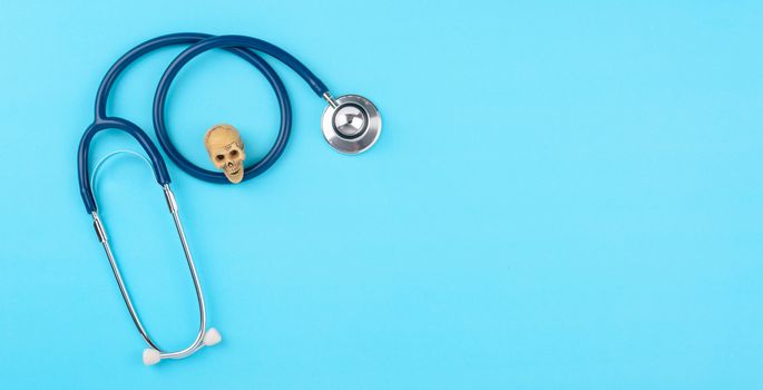 Doctor's Day concept, flat lay top view, stethoscope diagnosis of heart disease on blue background with copy space for text