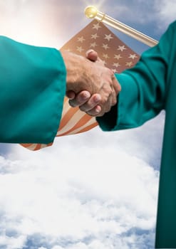 Digital composite of Senior people shaking their hands against american flag