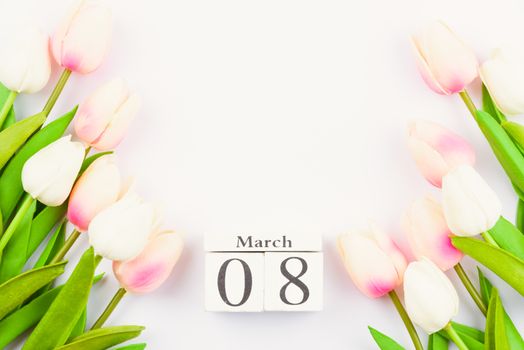 Happy Women's Day, Mother's Day and Valentine's Day concept. top view flat lay Tulip flower on white background, copy space for your text