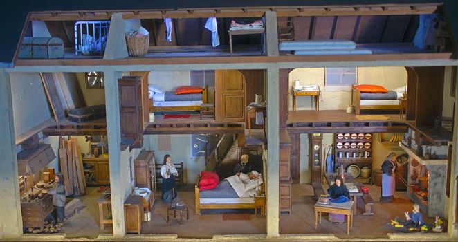 Small scale model representing house life in 19th century