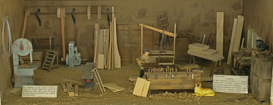 Small scale model representing old style carpenter shop