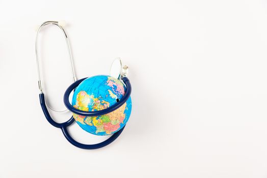 World health day concept, Stethoscope and globe on white background with copy space. Global health care