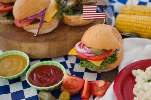 Hamburger decorated with 4th july theme on table