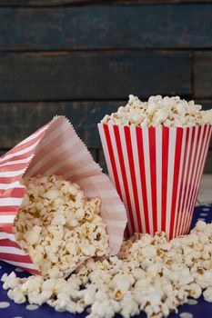 Close-up of scattered popcorn with 4th july theme