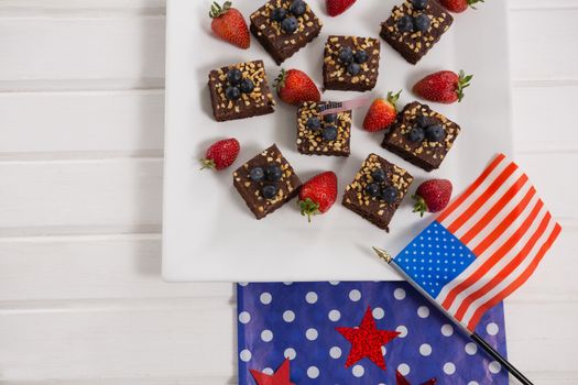 Cupcakes decorated with 4th july theme on wooden table