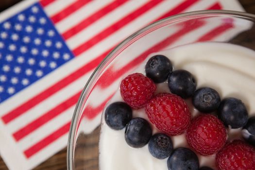 Close-up of fruit ice cream decorated with 4th july theme