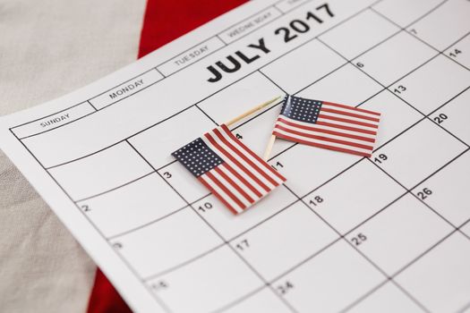 Calendar marked with American flags as reminder with 4th july theme