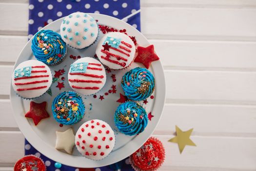 Decorated cupcakes with 4th july theme arranged on cakestand