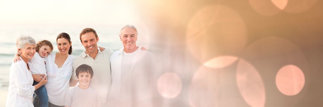 Digital composite of Family at beach with peach bokeh transition